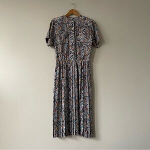 3/$20 Vintage 90s funky printed black and white midi dress with pleated skirt